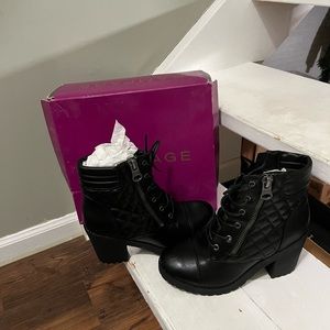 Black heeled combat boots
